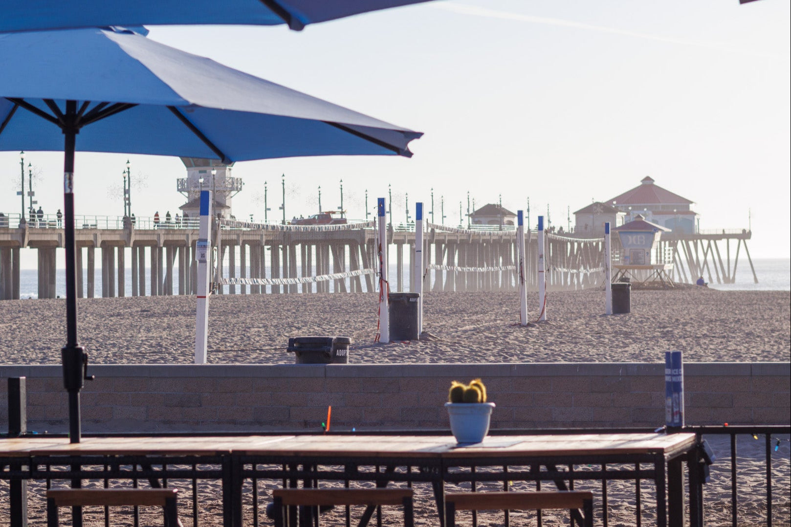 Zack's By the Beach surf shop in Huntington Beach offering beachwear, surfboards, electric bikes, and accessories for coastal living. Also there are alcoholic beverages  