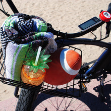 Load image into Gallery viewer, Beach cruiser with basket included, pineapple beverage, blanket, and football.
