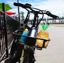 Load image into Gallery viewer, Electric bicycle and basket with sunscreen, a water bottle, and refreshment.
