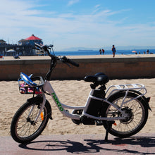 Load image into Gallery viewer, Childrens electric bicycle with basket.
